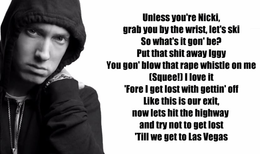 Eminem in a hoodie with Vegas lyrics.