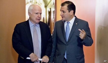 John Mccain and ted cruz walking together while in discussion