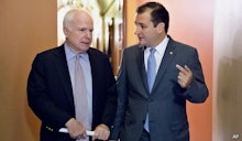 John Mccain and ted cruz walking together while in discussion