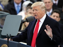 Trump giving a speech at a political rally