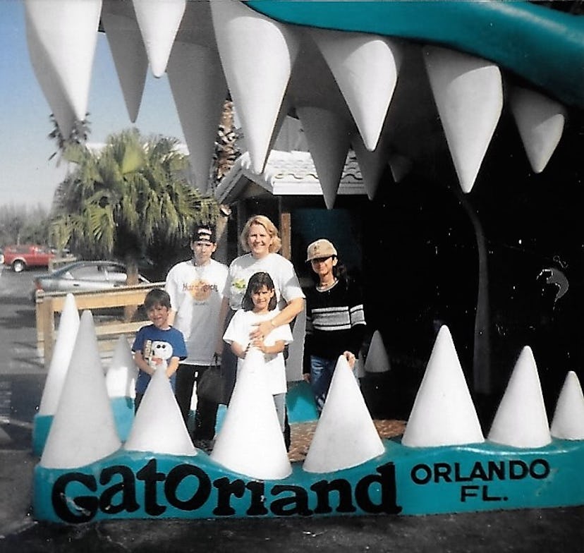 Peggy Price with her family at Gatorland in Orlando posing for a photo