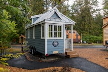 A light blue tiny house