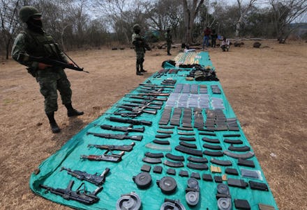 Mexican army guarding weapon taken from Mexican drug cartels