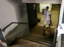 A scene from the commercial that shows Derek Jeter walking down the stairs in his jersey