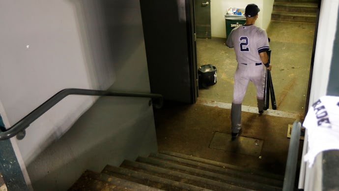 A scene from the commercial that shows Derek Jeter walking down the stairs in his jersey