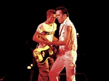 Joe Strummer and Paul Simonon in a live concert video that has been uploaded to YouTube.