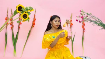 A model in a yellow dress in a Gorgeous photo series that shatters stereotypes about what it means t...