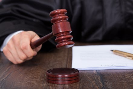 Judge in small claims court using his gavel.