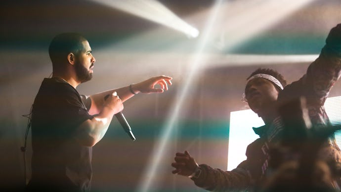 Drake and Young Metro performing