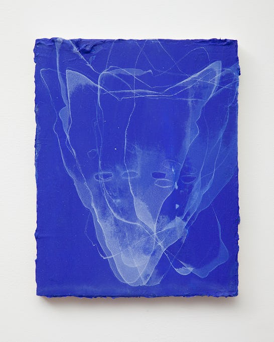 An abstract painting of a coyote on blue paper