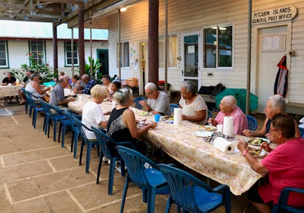 The population of Pitcairn a small 50 person country having dinner together