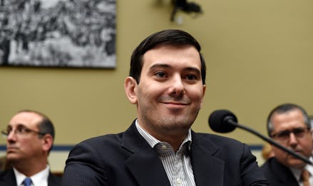 Martin Shkreli, who endorsed Donald Trump, sitting in front of a microphone 