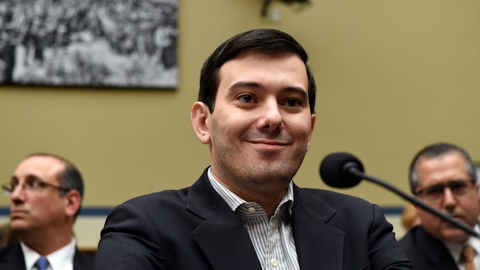 Martin Shkreli, who endorsed Donald Trump, sitting in front of a microphone 