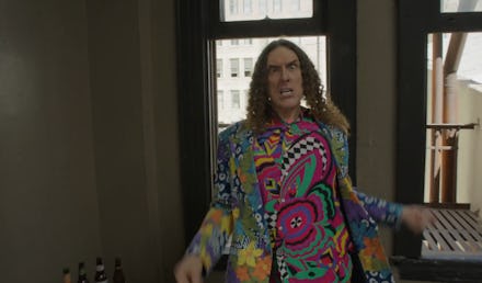 Weird Al Yankovic in a multicolored suit and shirt in the music video for "Tacky"