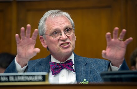Michael Botticelli, National Drug Control Policy deputy director with his hands up giving an impassi...