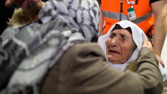 A 107-year-old Syrian refugee finally reunited with her family and hugging them