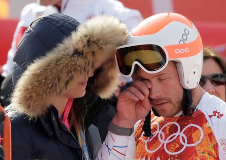 Bode Miller rubbing his eyes after a ride