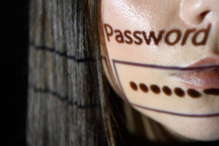 The bottom half of a woman's face with the word "password" and the tab for entering a password along...