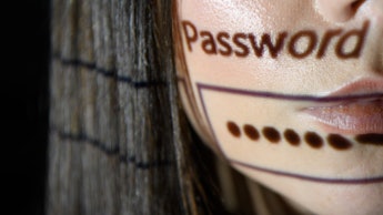 The bottom half of a woman's face with the word "password" and the tab for entering a password along...