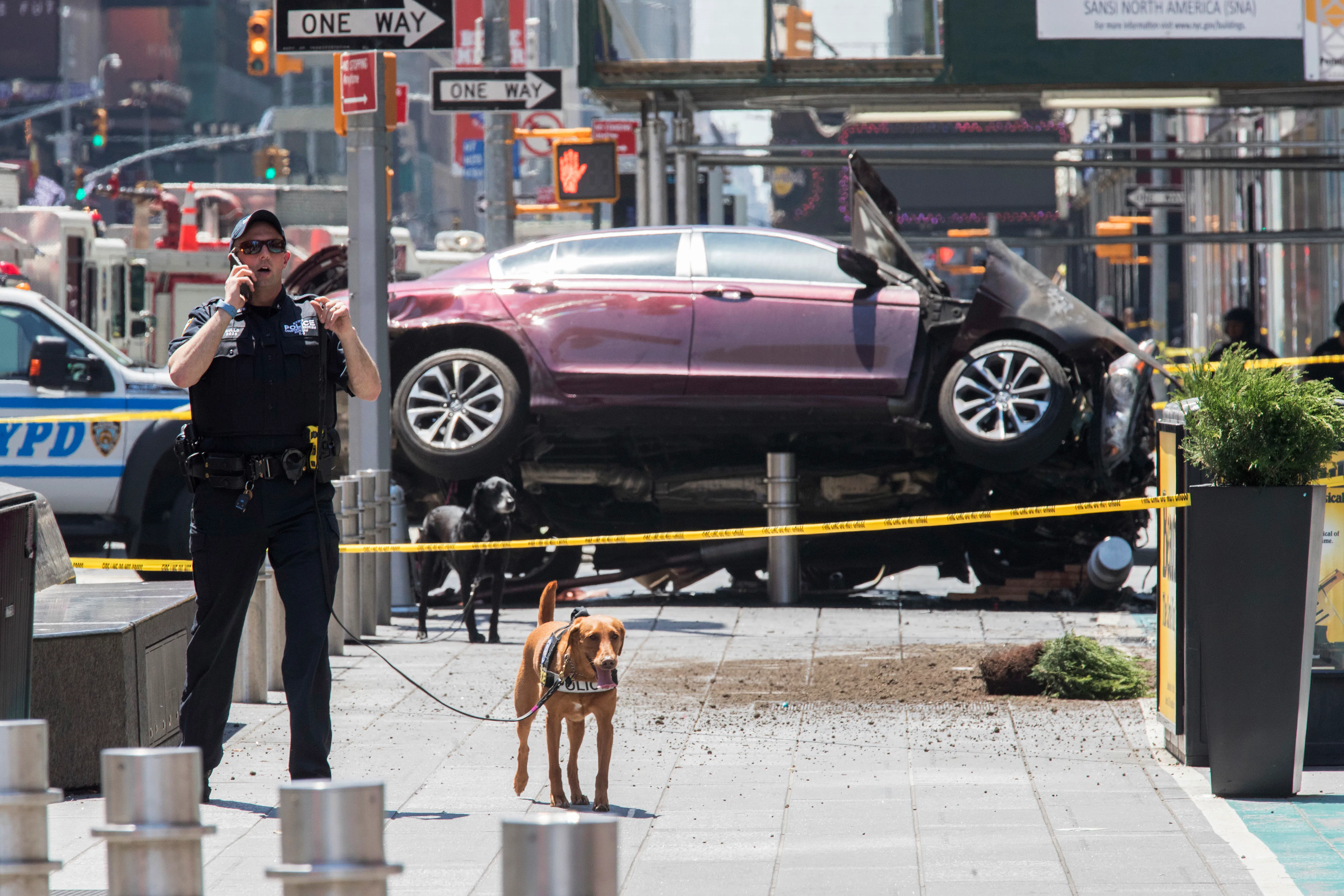 One killed, 22 injured after car plows through Times Square sidewalk