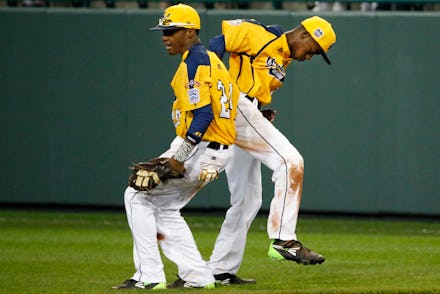 Trey Hondras celebrating with Pierce Jones at the Little League World Series tournament in South Wil...