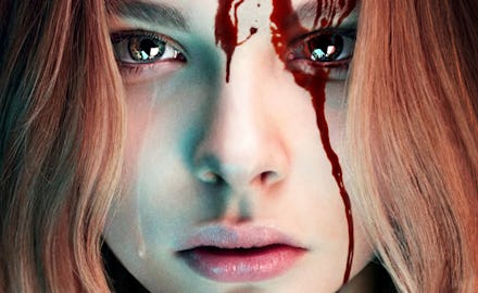 Chloë Grace Moretz with blood running down her face in the Carrie remake