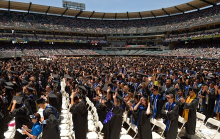 A large crowd with students during their graduation ceremony; a case for free college tuition