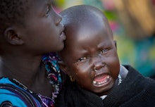 A South Sudanese boy crying