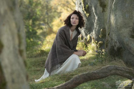 Caitriona Balfe in Outlander in a forest