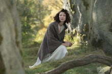 Caitriona Balfe in Outlander in a forest