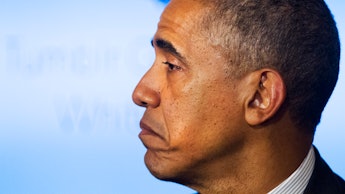 A side-profile close-up of Barack Obama who just broke a major promise to the American people