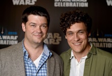 Chris Miller and Phil Lord posing and smiling at the Star Wars premiere