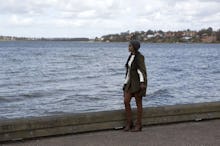 Rachel Lindsay from "The Bachelorette" taking a walk along the seaside 