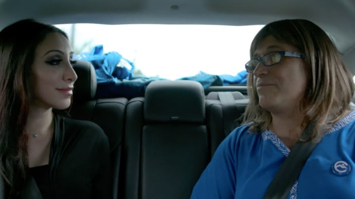 Christine Hallquist sitting at a car backseat during a ride