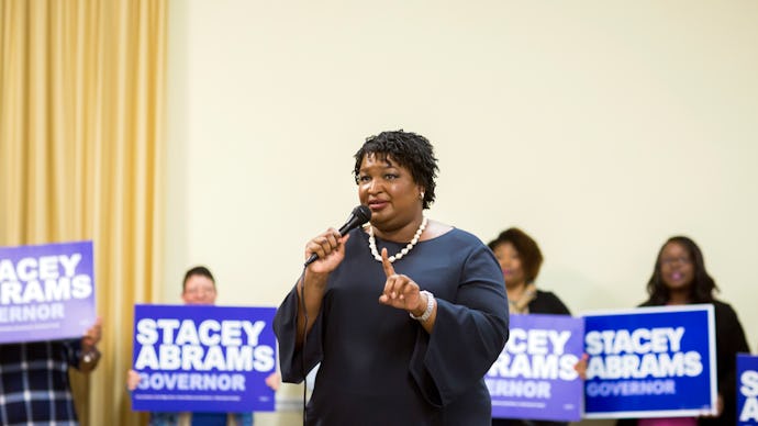 Democratic candidate for Georgia governor Stacey Abrams speaking in front of a crowd of supporters