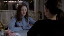 A scene from 'Gilmore Girls' with Rory at a diner