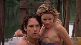 Paul Rudd and Elizabeth Banks sit by the pool in Wet Hot American Summer