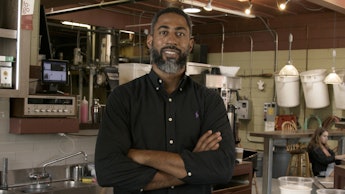  the owner of two Northwest Coffee Roasting Company stores in St. Louis, Jason Wilson posing in his ...