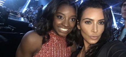Simone Biles taking a selfie with Kim Kardashian West at the 2016 MTV VMAs