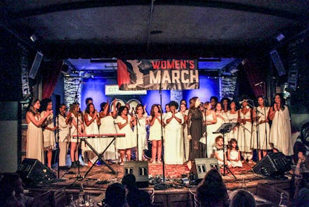 Members of the Women’s March on stage at a pop-up concert launching ‘Resistance Revival’, all dresse...