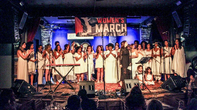 Members of the Women’s March on stage at a pop-up concert launching ‘Resistance Revival’, all dresse...