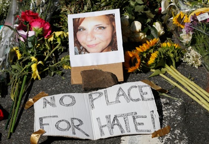 A memorial site with a picture of Heather Heyer and a board with the text 'NO PLACE FOR HATE!'