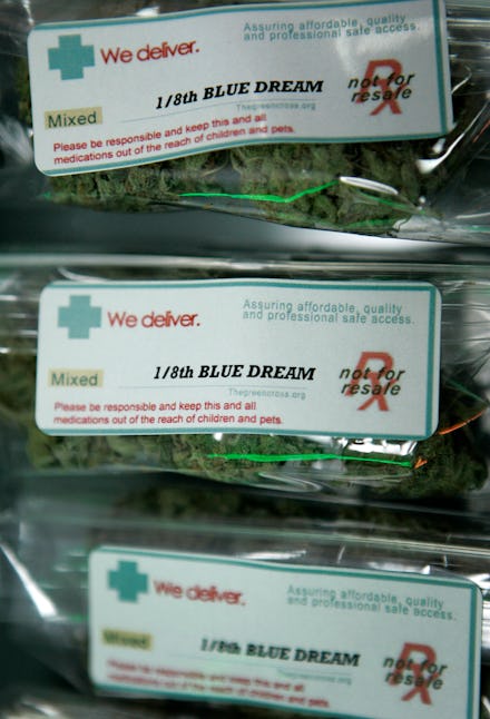 Image showing three packages of an eighth of weed