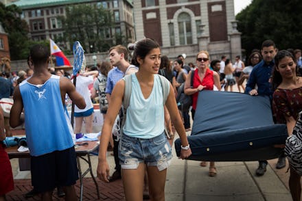 A group of students protesting The Columbia Student Accused of Raping "Mattress Girl" Emma Sulkowicz
