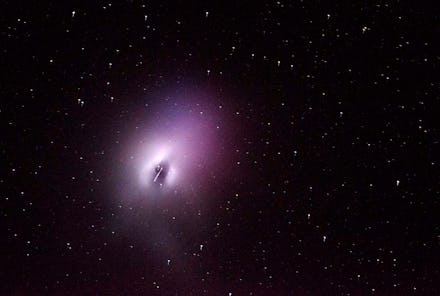 NASA's shot of the space with a purple star-like object glowing