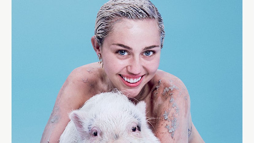 PICTURE: Miley Cyrus. Naked. Mud-Wrestling With Her Pet 