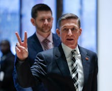 Michael Flynn putting up the peace sign with his fingers