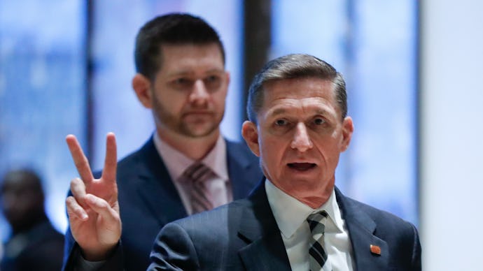 Michael Flynn putting up the peace sign with his fingers