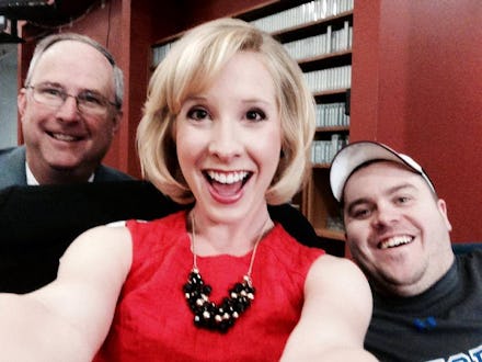 Late Alison Parker and Adam Ward taking a selfie with a man standing next to them