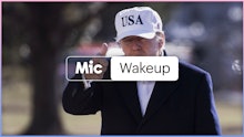 "Mic wakeup" text over Donald Trump walking with a white golf cap